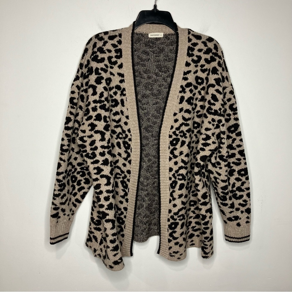 And the why animal print sweater‎ size M/L
